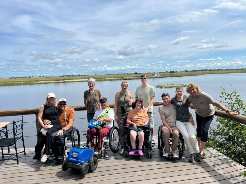 Group of travellers, some in wheelchairs